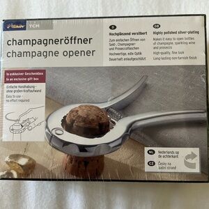 Tchibo Highly Polished Silver-Plating-No -Tarnish Easy Open Champagne Opener.